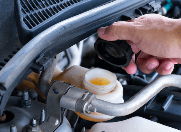 What is brake fluid used for?